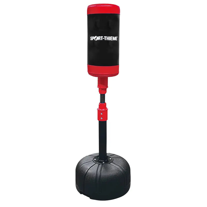 Freestanding punching bag return