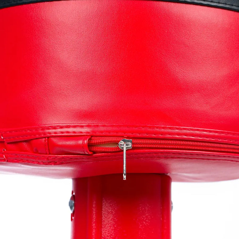 Freestanding punching bag return